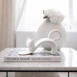 Stretching Cat White Ceramic Sculpture