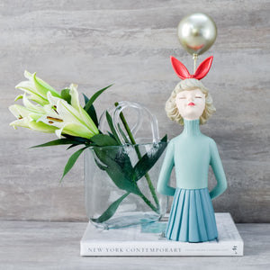 Olivia with a Balloon Sculpture