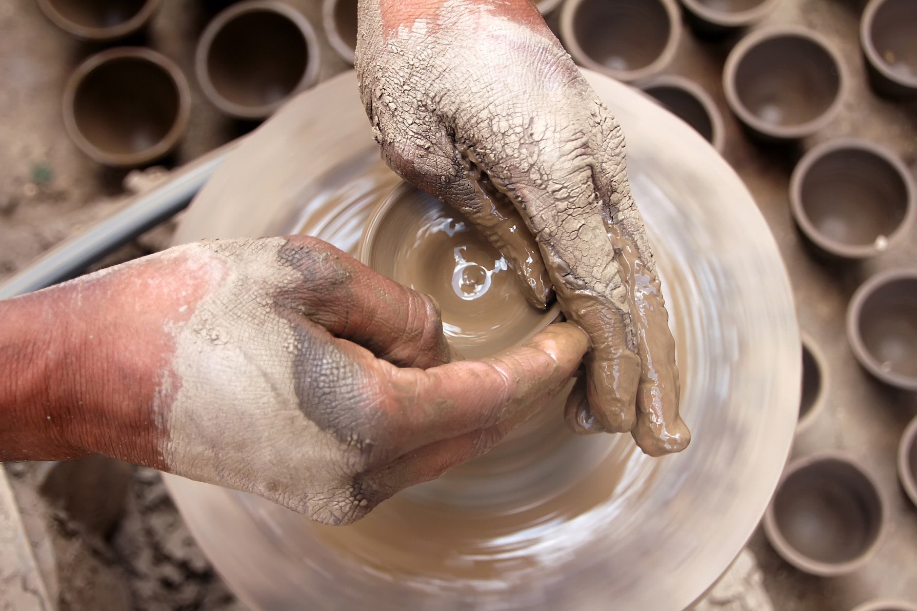 A Tale of Fire and Clay: The Journey of Our Cups from the Potter’s Wheel to Your Dining Table