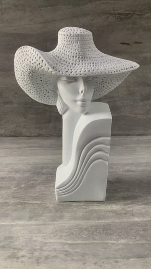 Dakota with a Hat Sculpture