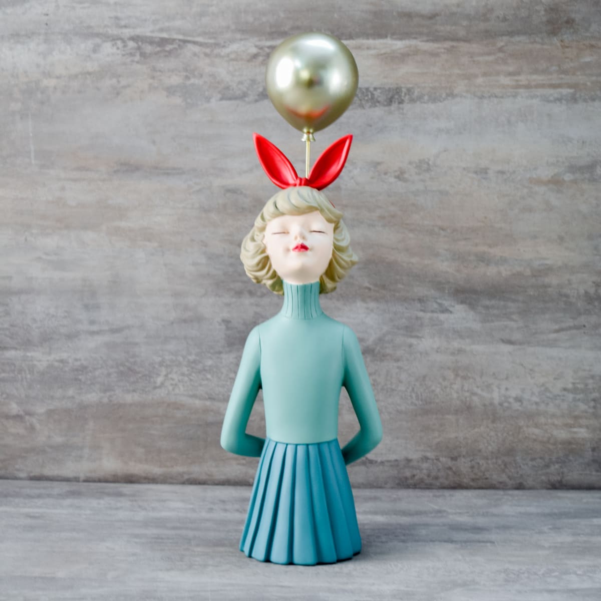 Olivia with a Balloon Sculpture - Home Artisan