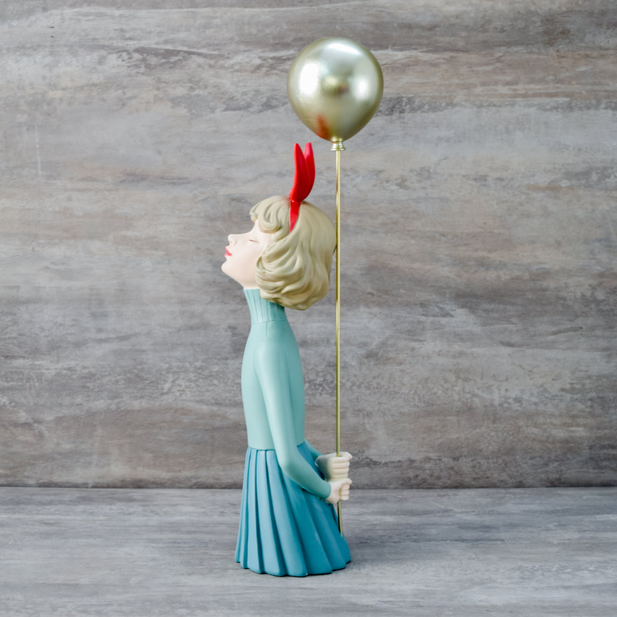 Olivia with a Balloon Sculpture - Home Artisan