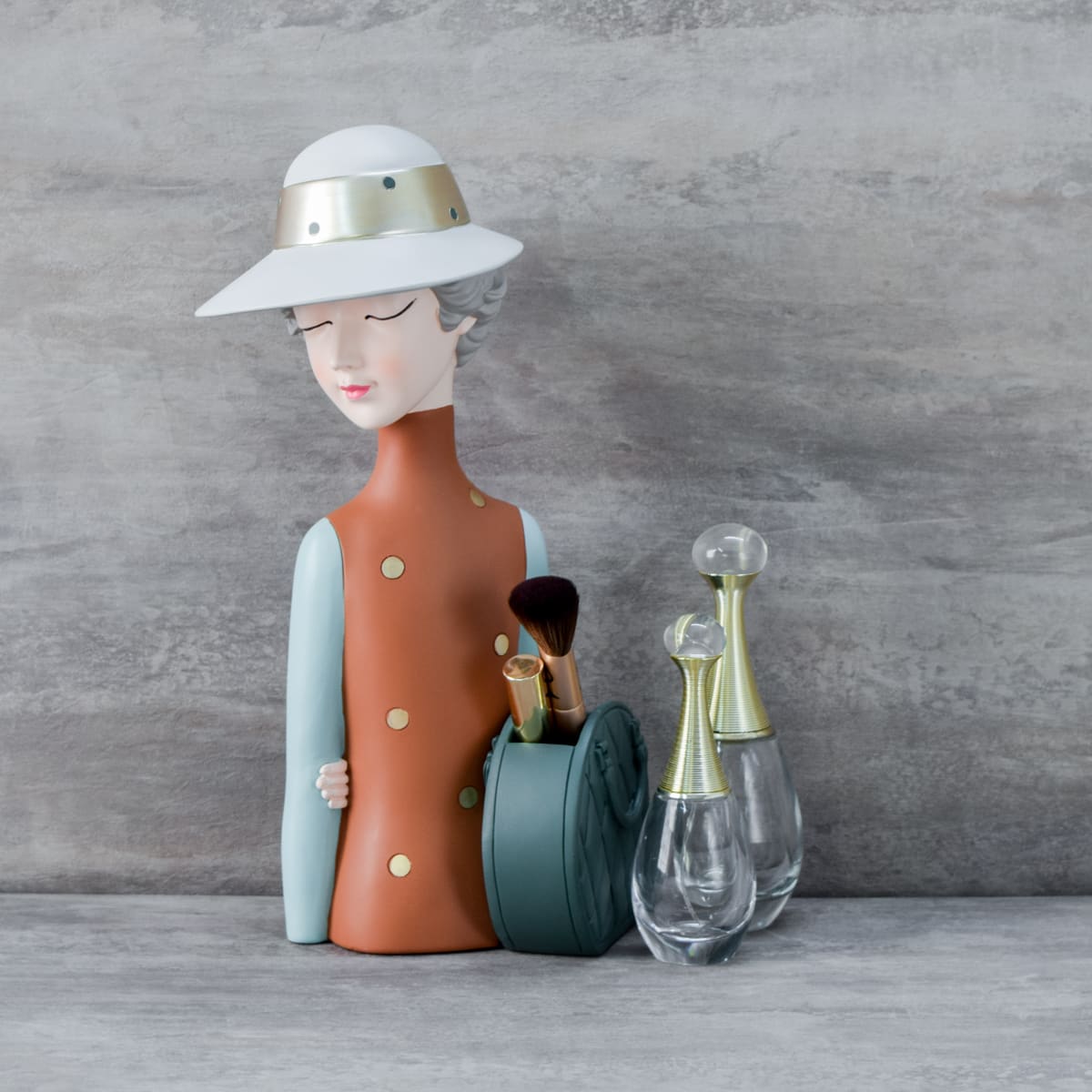 Andrea with a Bag Sculpture - Home Artisan