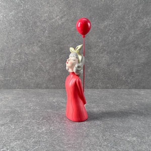 Scarlette with a Baloon Sculpture