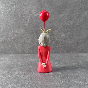 Scarlette with a Baloon Sculpture