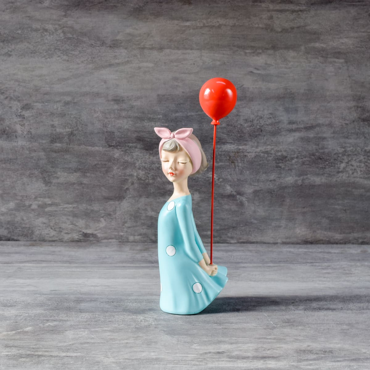 Erlina Standing with a Balloon - Home Artisan